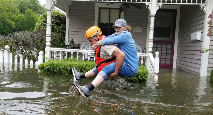 A solider conducts a rescue operation near Houston in the aftermath of Hurricane Harvey. Photo by 1Lt. Zachary West, 100th MPAD. 