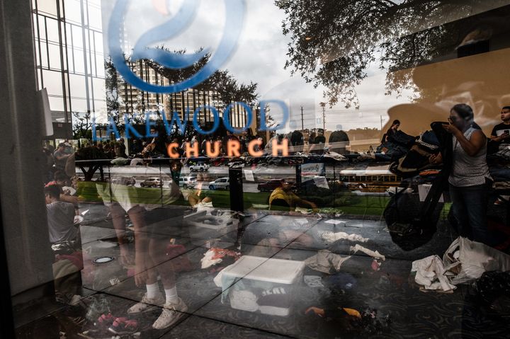 Volunteers take donations at the Lakewood Church in Houston. 