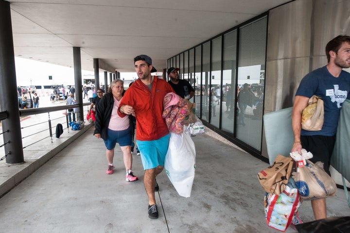 People bring donations to Lakewood Church.