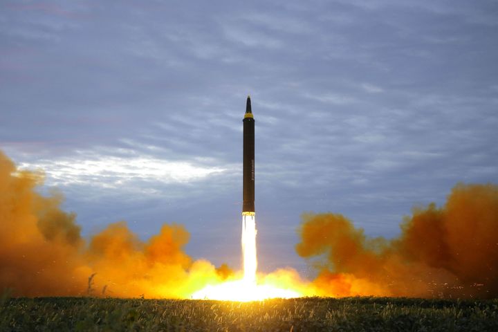 A missile is launched during a long and medium-range ballistic rocket launch drill in this undated photo released by North Korea's Korean Central News Agency