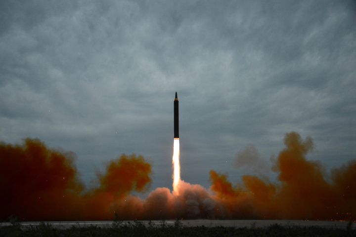 A missile is launched during a long and medium-range ballistic rocket launch drill in this undated photo released by North Korea's Korean Central News Agency