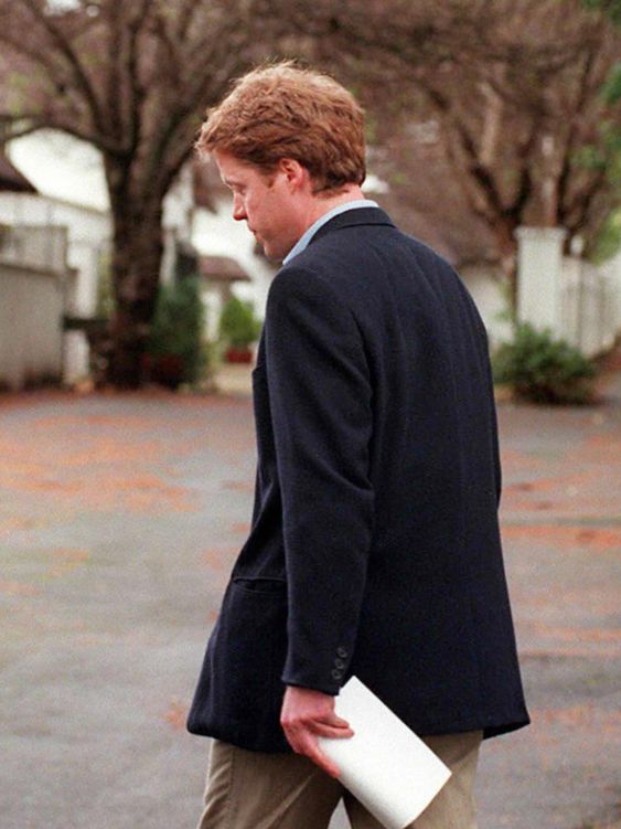 Princess Diana's brother, Earl Spencer turns away from the press after reading a brief statement about his sister's death at the entrance to his home in Constantia, Cape Town 