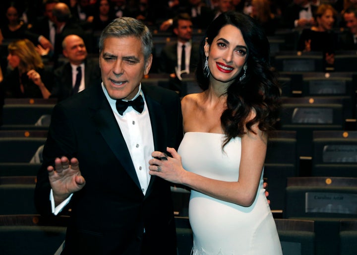 Actor George Clooney, pictured with wife Amal Clooney, the respected international human rights lawyer, took a <a href="https://www.huffpost.com/entry/george-clooney-edward-r-murrow_n_58b1c65be4b060480e0879f8?utm_hp_ref=george-clooney" target="_blank" role="link" class=" js-entry-link cet-internal-link" data-vars-item-name="thinly veiled swipe" data-vars-item-type="text" data-vars-unit-name="59a69970e4b063ae34da1bdb" data-vars-unit-type="buzz_body" data-vars-target-content-id="https://www.huffpost.com/entry/george-clooney-edward-r-murrow_n_58b1c65be4b060480e0879f8?utm_hp_ref=george-clooney" data-vars-target-content-type="buzz" data-vars-type="web_internal_link" data-vars-subunit-name="article_body" data-vars-subunit-type="component" data-vars-position-in-subunit="5">thinly veiled swipe</a> at the U.S. president while attending the Cesar Awards ceremony in Paris.