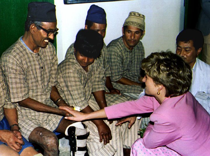 Princess Diana speaks with a leprosy sufferer at the Anandaban Hospital in Nepal