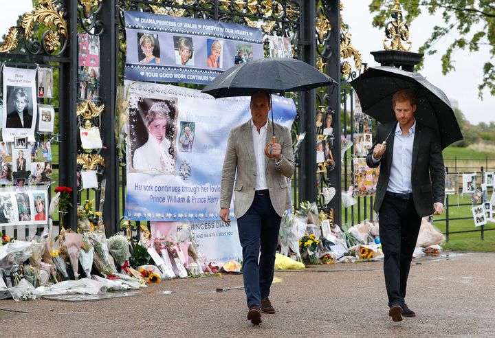 The Duke of Cambridge and Prince Harry depart after viewing tributes to Diana.