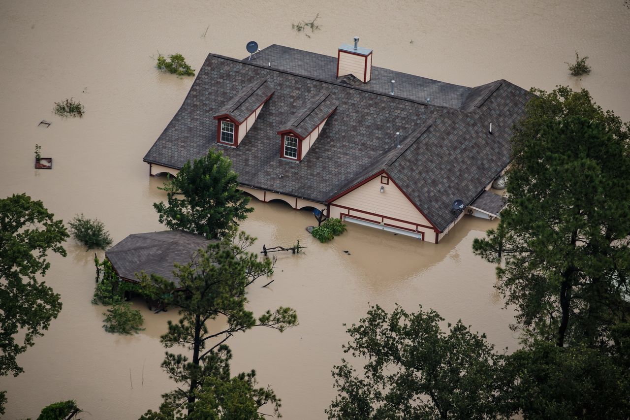 A Houston house sits submerged in floodwater after Hurricane Harvey.