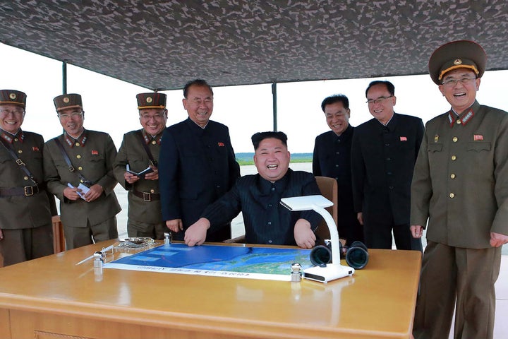 This picture from North Korea's official Korean Central News Agency (KCNA) released on Aug. 30, 2017 shows North Korean leader Kim Jong-Un (center) watching the launch.