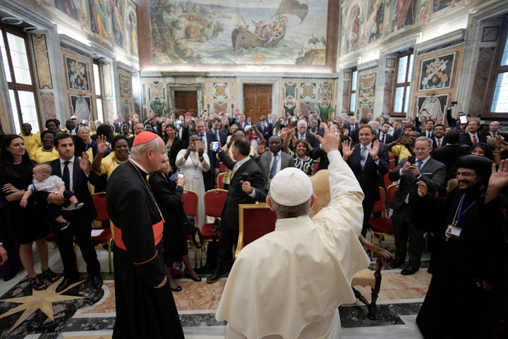 Former White House Press Secretary and Communications Director Sean Spicer takes a picture of Pope Francis, during a special