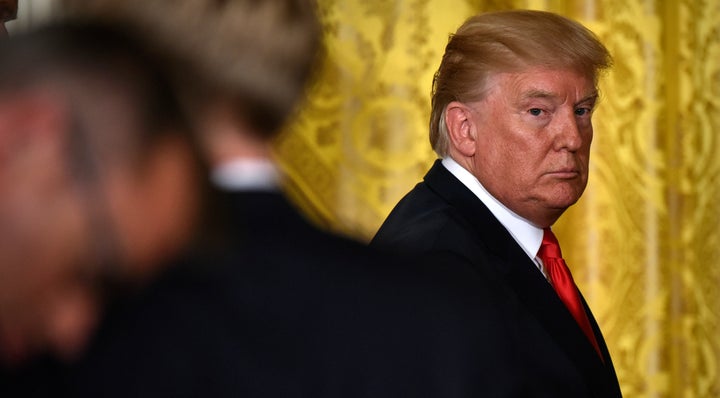 President Donald Trump glances back at the room as he departs after holding a joint press conference with President Sauli Niinistö of Finland on Aug. 28, 2017, in Washington, D.C.