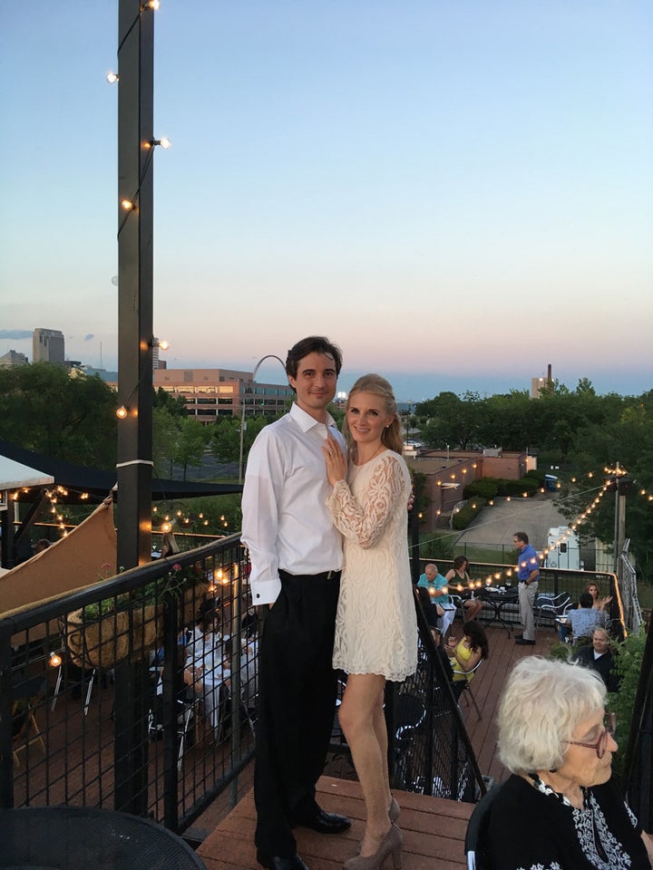 The post-ceremony celebration included dinner at Vin de Set restaurant. You can see a view of the Arch behind the groom.