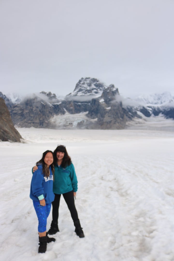 The author and her daughter after landing on a glacier accessible only by ski plane.