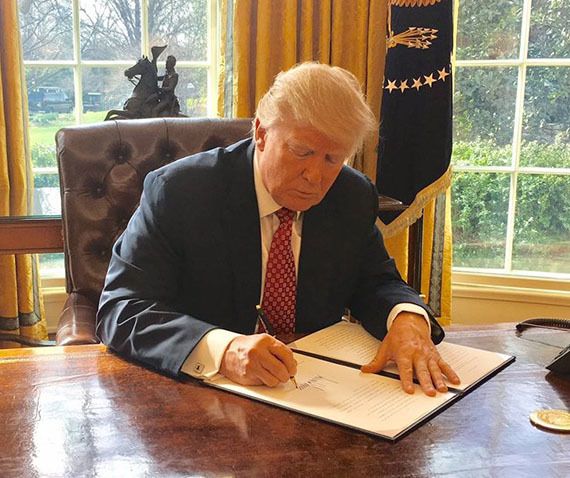 President Donald Trump signing Executive Order. PUBLIC DOMAIN /Wikimedia 