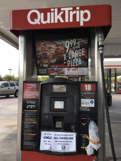 "We are currently out of ALL GASOLINE" a sign reads at a Gallas QuickTrip.