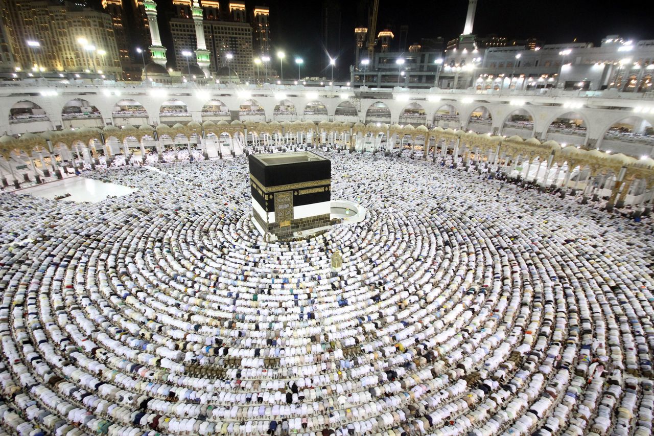 Muslim worshippers perform the evening prayers at the Kaaba, Islam's holiest shrine.