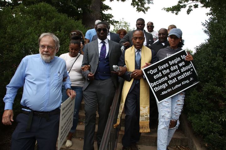 Religious leaders including Rev. Cornell Brooks and activists marching together with the local community to end white supremacy.  
