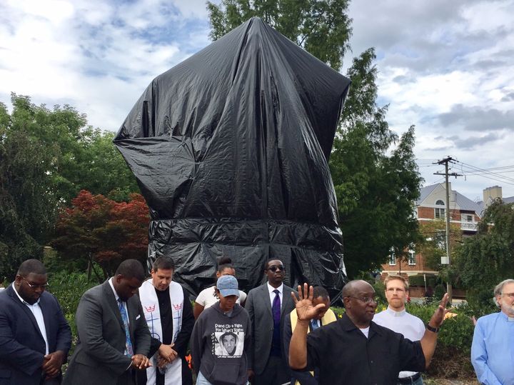 Religious and community leaders kicking off the March to Confront White Supremacy in front of the Robert E. Lee statue in Charlottesville, Va., which was covered up after the deadly incidents a few weeks ago.  