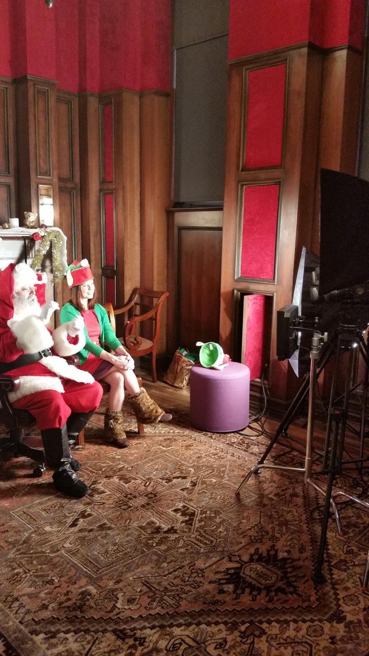 <p>“Amber Elf” and Santa sing with the pediatric patients through live video in “Santa Connection”, one of the services offered through Companions In Courage</p>