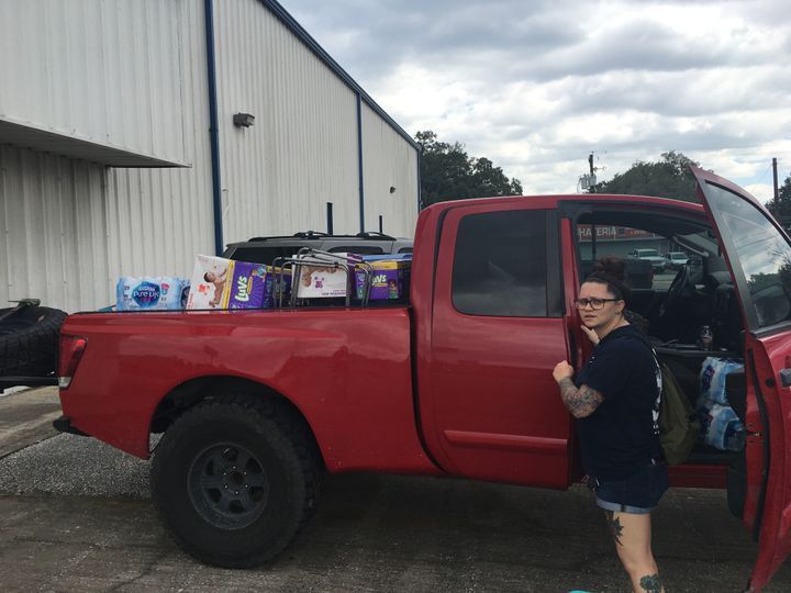Felicia Weir of Santa Fe, Texas, with supplies to distribute from her union hall. 