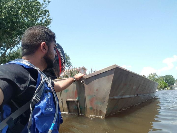 AMYA volunteers set out by boat to rescue Houston residents trapped in their homes.