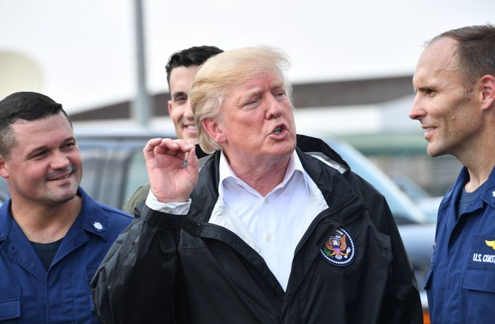 President Donald Trump speaks with military personnel on Saturday, Sep. 2, 2017, before departing for Louisiana to continue his tour of areas affected by Hurricane Harvey.