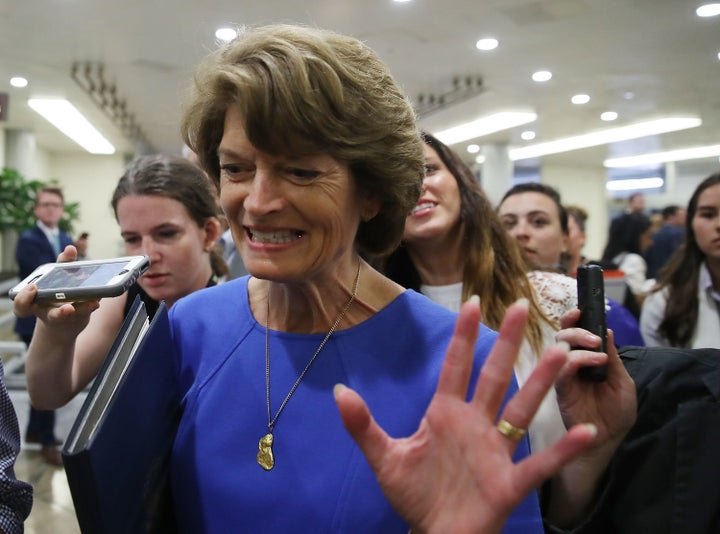 Sen. Lisa Murkowski (R-Alaska) flees reporters in July who were asking how she planned to vote on Obamacare repeal legislation. She stuck it to the president and her party leaders by helping to kill it.