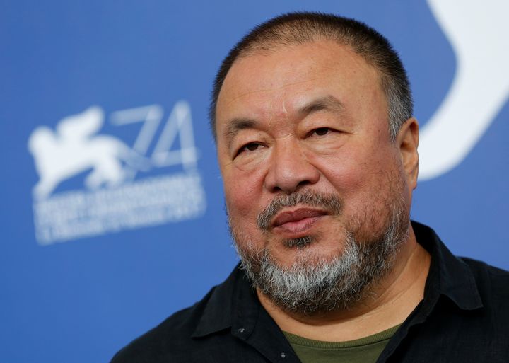 Ai Weiwei poses during a photo call for his documentary, "Human Flow," at the Venice Film Festival. Sept. 1.