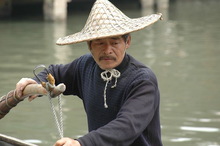 <p> <em>A boatman at Wuzhen</em></p>