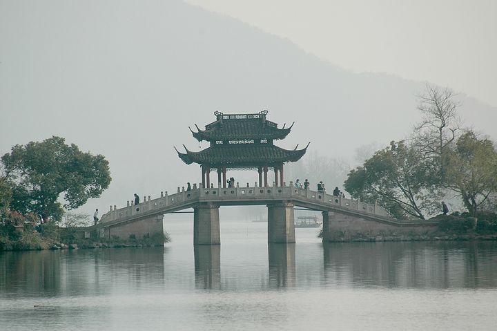 <p> <em>A bridge adds to the picturesque quality of West Lake, Hangzhou, China, as charming as it was in Marco Polo’s day.</em></p>