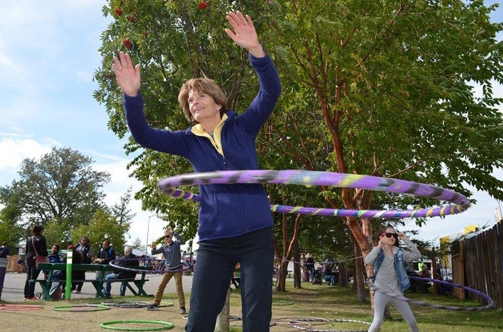 Murkowski, living her best life, hula hooping with constituents at the Alaska State Fair in August.