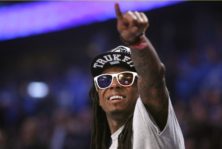 Rapper Lil Wayne, pictured here in 2012, was hospitalized in Chicago on Sunday after suffering an epileptic seizure, reported TMZ.