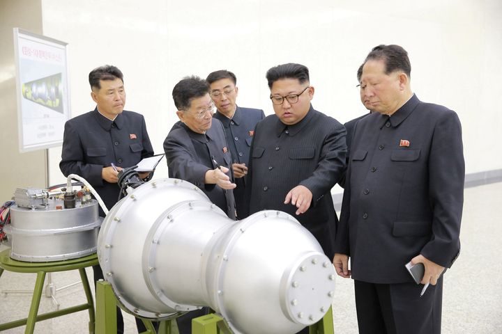 North Korean leader Kim Jong Un next to what the country said is a hydrogen bomb.