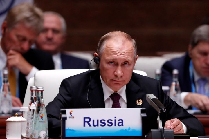 Putin attending a plenary session of BRICS on Monday.