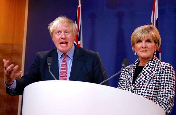 Johnson talks with Australian Foreign Minister Julie Bishop during a media conference in Sydney, Australia, 27 July.