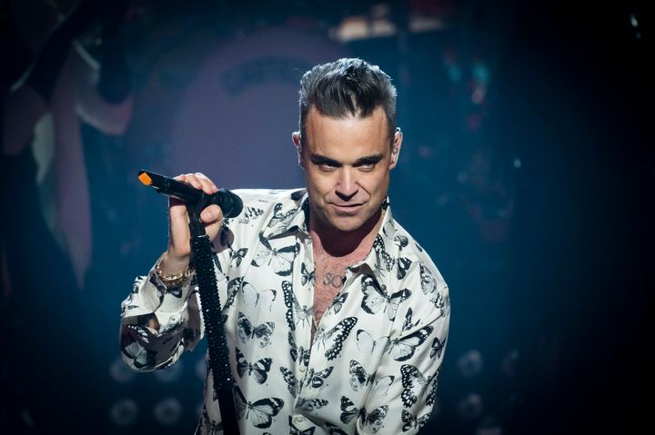 Robbie Williams has spoken about the dark side of fame