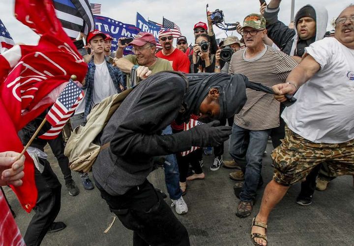 Violence erupts at a ‘Make America Great Again’ rally in Huntington Beach, CA. 
