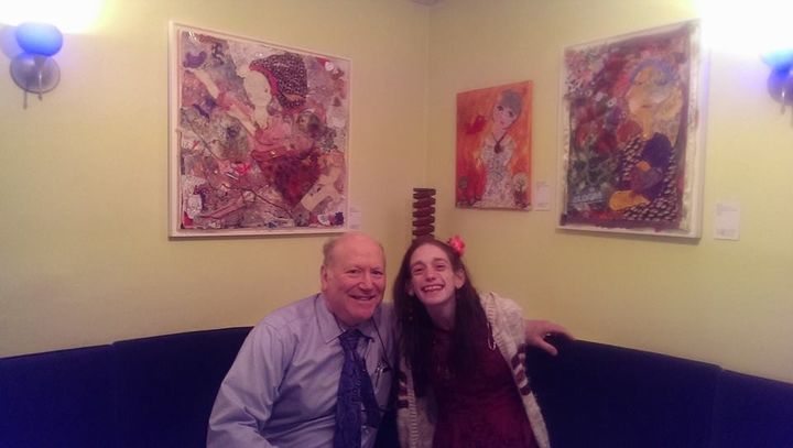 Me and my Dad with my mixed media art on display. Fancy Italian restaurant and what do we get?PIZZA.