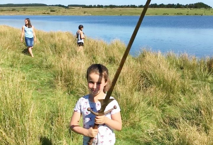 The 7-year-old was swimming around the lake last week when she spotted the sword on the ground.