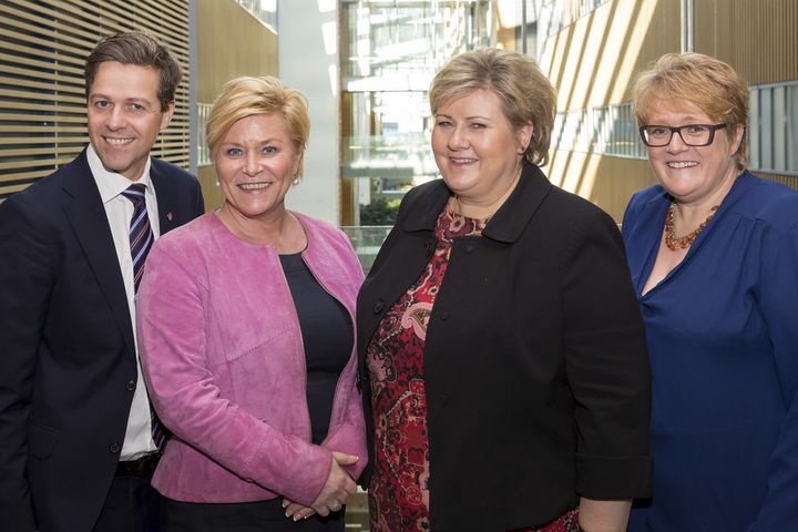 The current government is backed by the Christian Democrats and the Liberals. On the left, the head of the CD Knut Arild Hareide, next to Finance Minister Siv Jensen from the Progress Party, the PM, and the head of the Liberal Party, Trine Skei Grande. 
