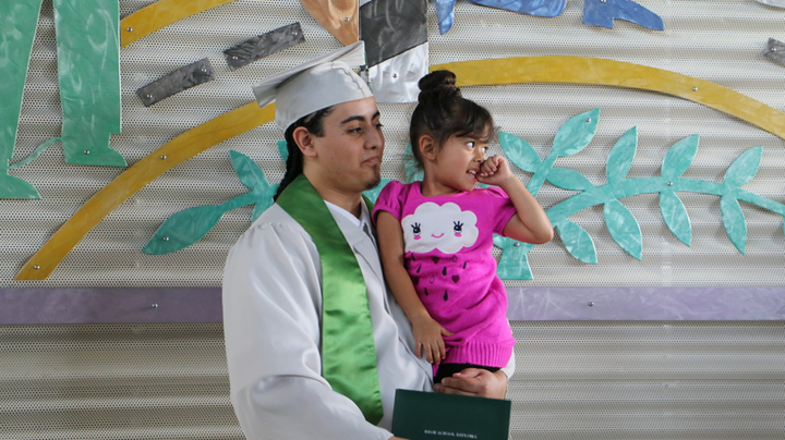 Daniel with his daughter Mila at Green Hill School Juvenile Detention Center at his graduation and before he was transferred to the adult prison in August 2016 and his rights terminated in July 2017.