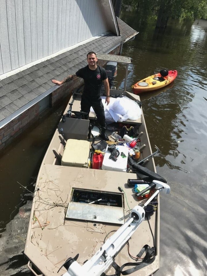 Parry transporting the wedding dress to dry land. 