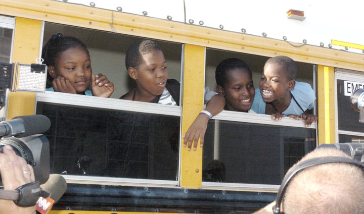 Children head off to their first day of school in Houston on Sept. 8, 2005, in the aftermath of Hurricane Katrina.