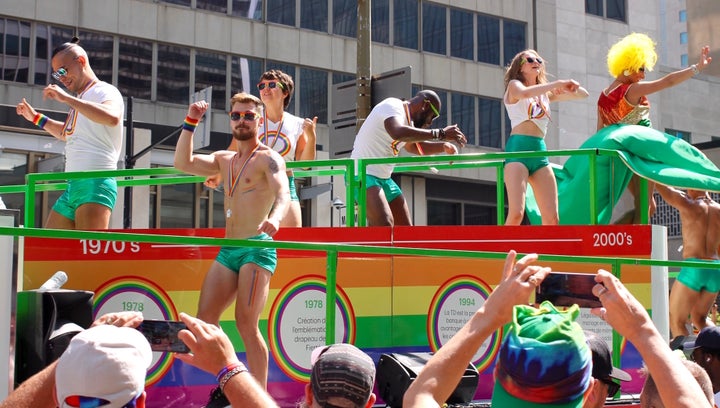 A moment from this year’s <a rel="nofollow" href="https://veetravels.com/2017/08/22/montreal-pride-photos-canada-pride/" targ