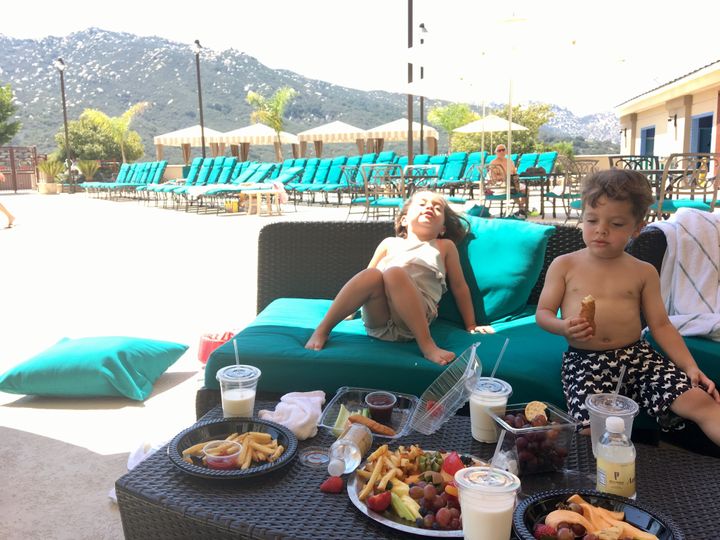Miles and London lounging in their Lassig smart Swim Tanksuit and Board Shorts during our #endless summer adventure.