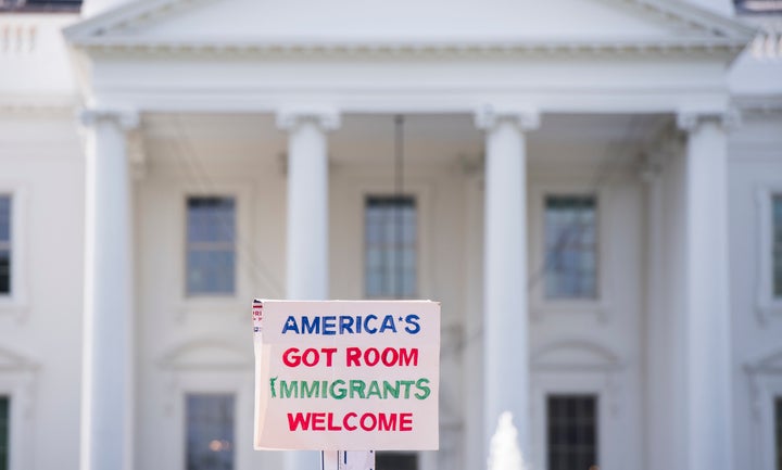 Immigration rights demonstrators prepare to march from the White House to the Trump Hotel and the Justice Department to oppose President Trump's decision to end the DACA program for 'dreamers' on Tuesday. 