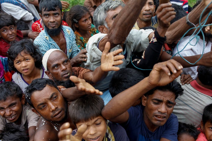 Rohingya refugees wait for aid at Kutupalong refugee camp in the town of Teknaf, Bangladesh, on Sept. 5, 2017.