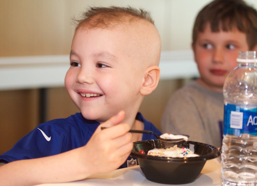 Pediatric cancer patient and Mark Herzlich fan, Joey, cannot contain his excitement as his face lights up when his idol ente