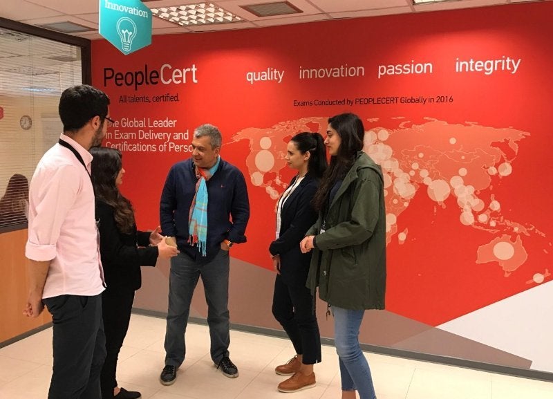 Byron Nicolaides with students