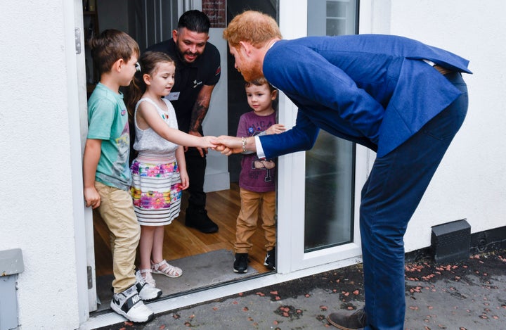 Lily-Anne and Prince Harry enjoying a conversation. 