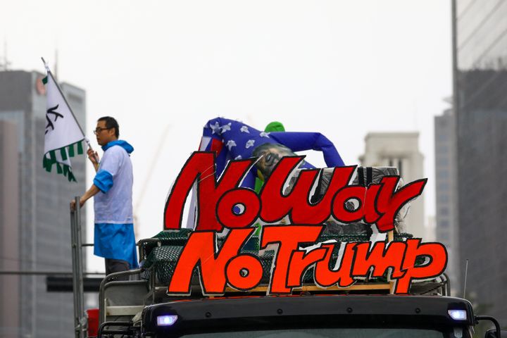 The placard "No War No Trump" appeared atop a truck at a rally in Seoul last month.