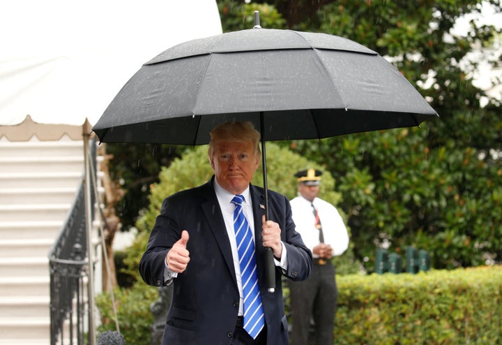 President Donald Trump gives a thumbs up as he departs the White House to North Dakota on Sept. 6, 2017.